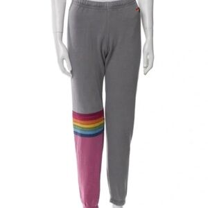 Aviator Nation rainbow striped color-block sweatpants in grey and pink.